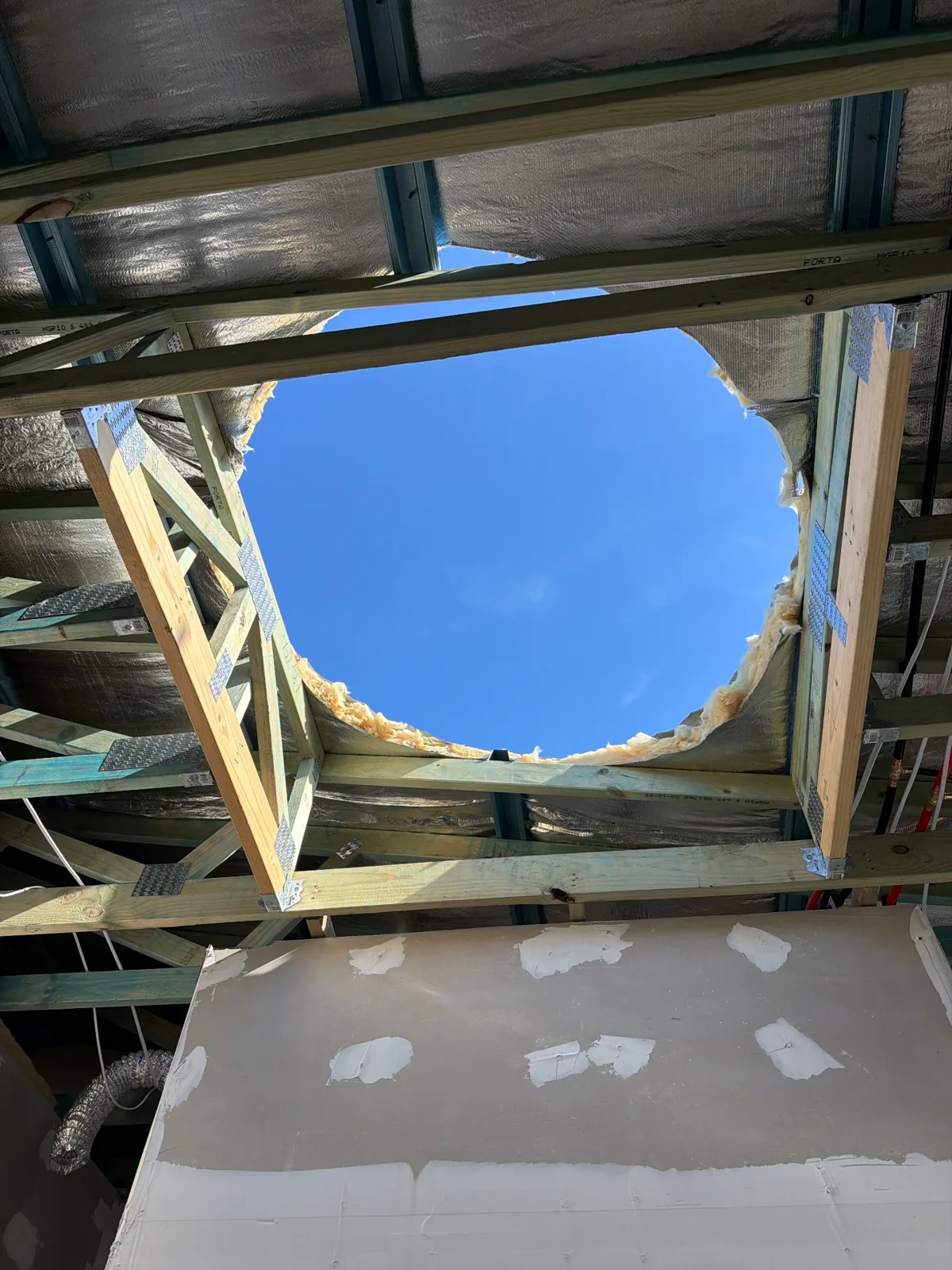 Timber framing around the skylight opening at 1 Toolang Road · 2026-09-30