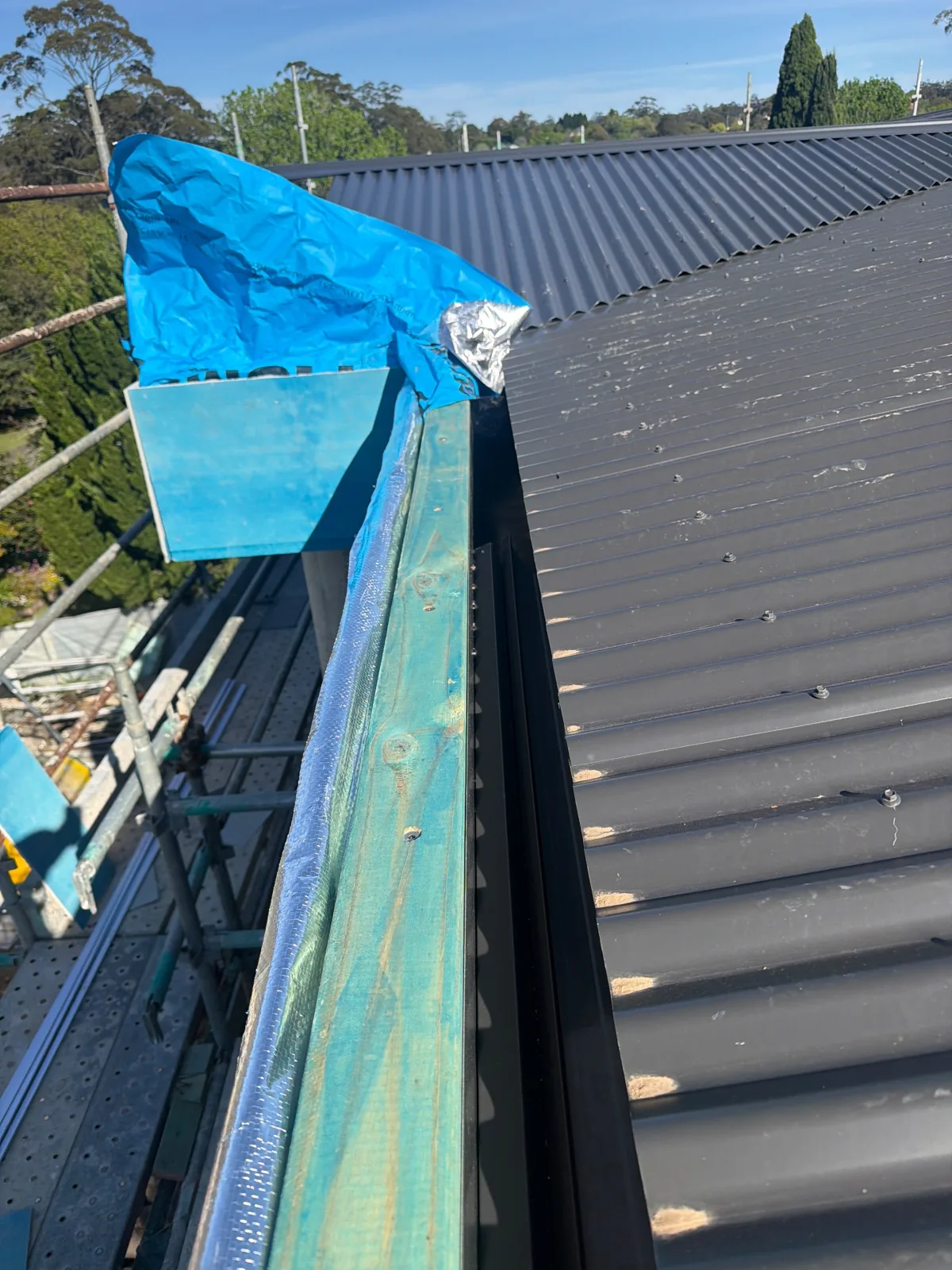 Temporary covering at the roof edge at 14 Wolsten Avenue · 2026-10-01