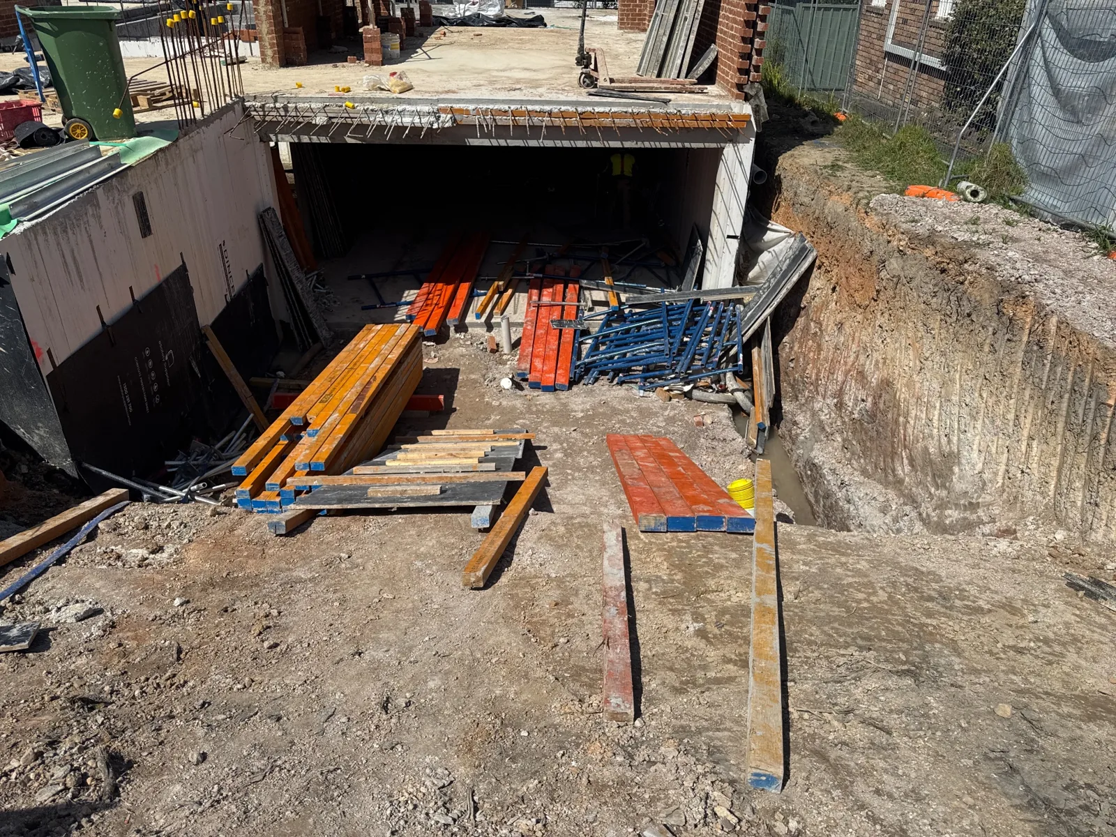 Basement opening and removed formwork materials at 6 College Crescent · 2026-09-30