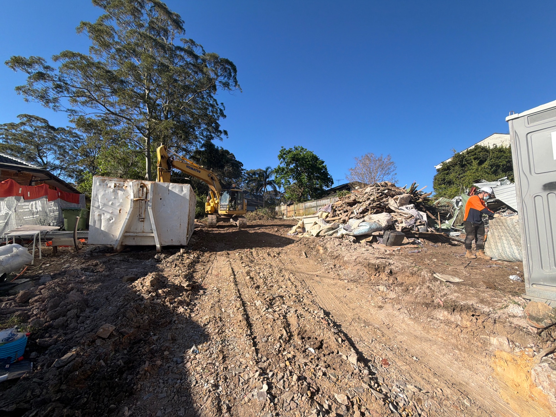Excavator and demolition debris at 3 Amesbury Avenue.