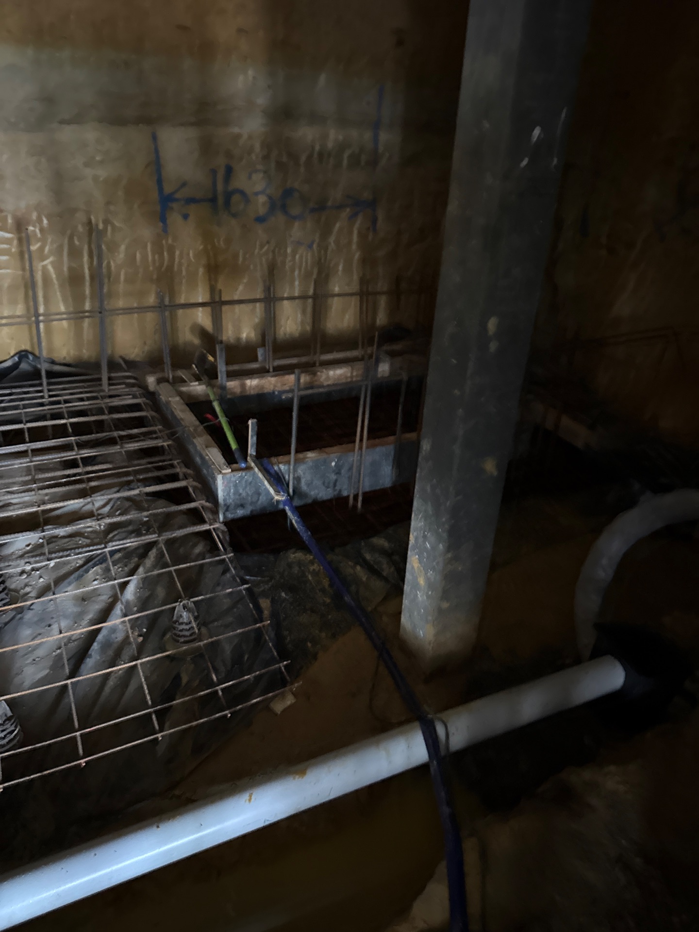 Reinforcement, formwork and pipework in the 75 Cutler Road site photograph.